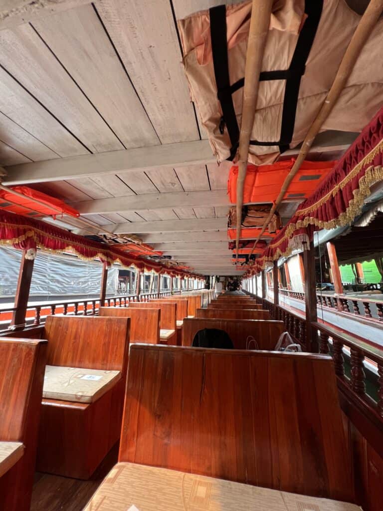 The budget Slow Boat. Mix of Wooden seats and Bus seats