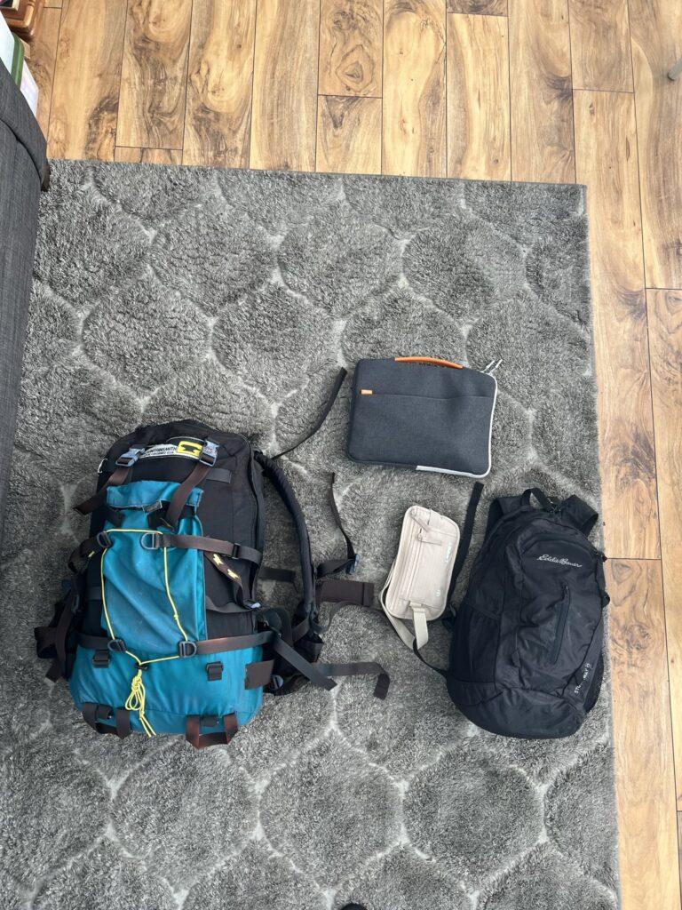 Travel bags and backpacks laid out, Destin, Florida, United States.