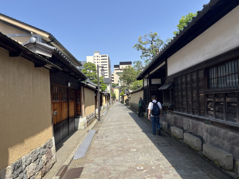 Traditional Japanese street lined with old buildings, Nagamachi Samurai District, Kanazawa, Ishikawa Prefecture, Japan.